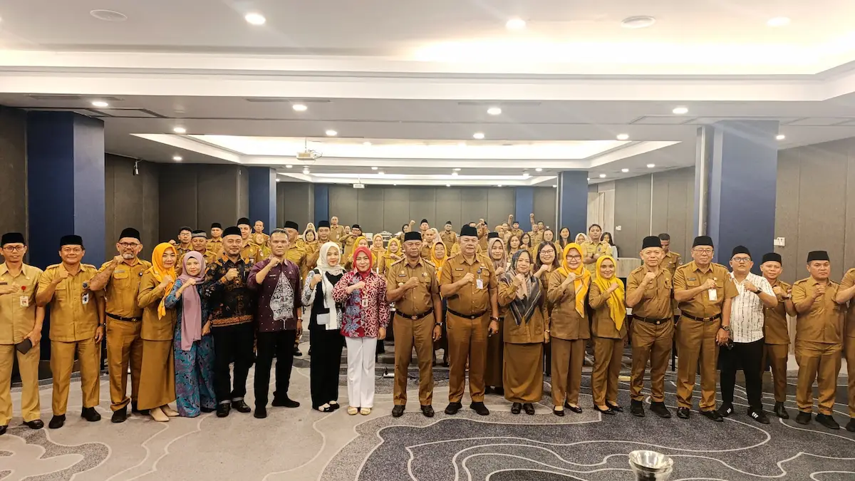 Bupati Boltim Oskar Manoppo foto bersama pimpinan OPD pada Workshop LPPD 2025 di Manado mediasulut.id