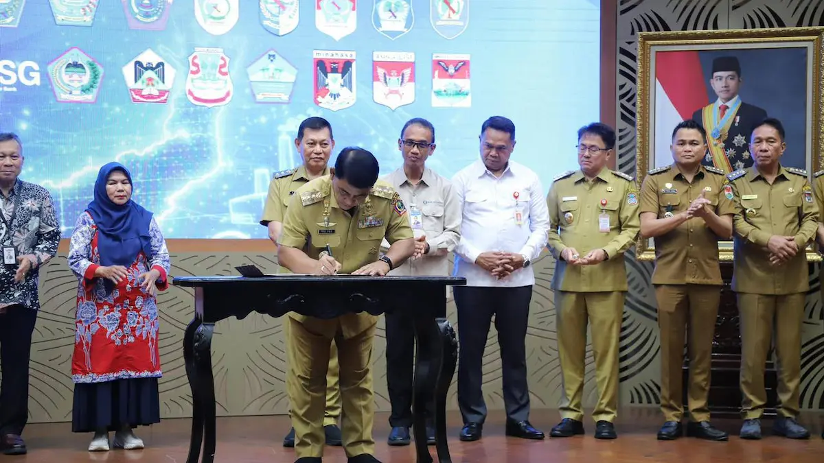 Yulius Selvanus menandatangani dokumen kerja sama ekonomi Sulut mediasulut.id