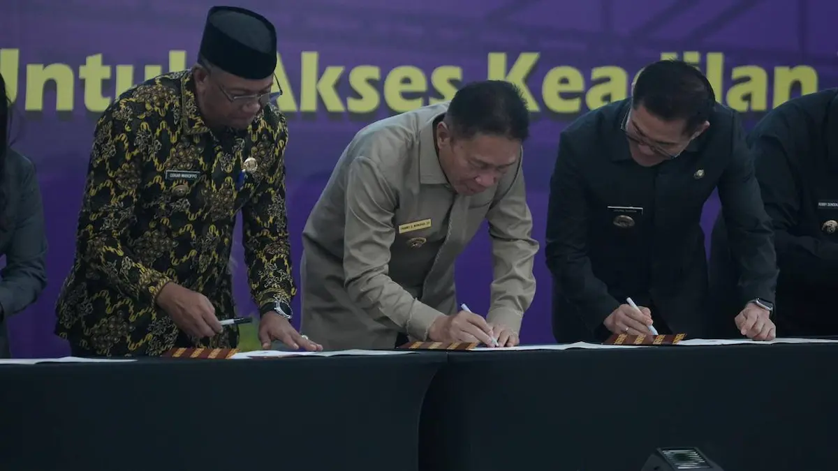Franky Wongkar tanda tangan MoU Posbakum Manado