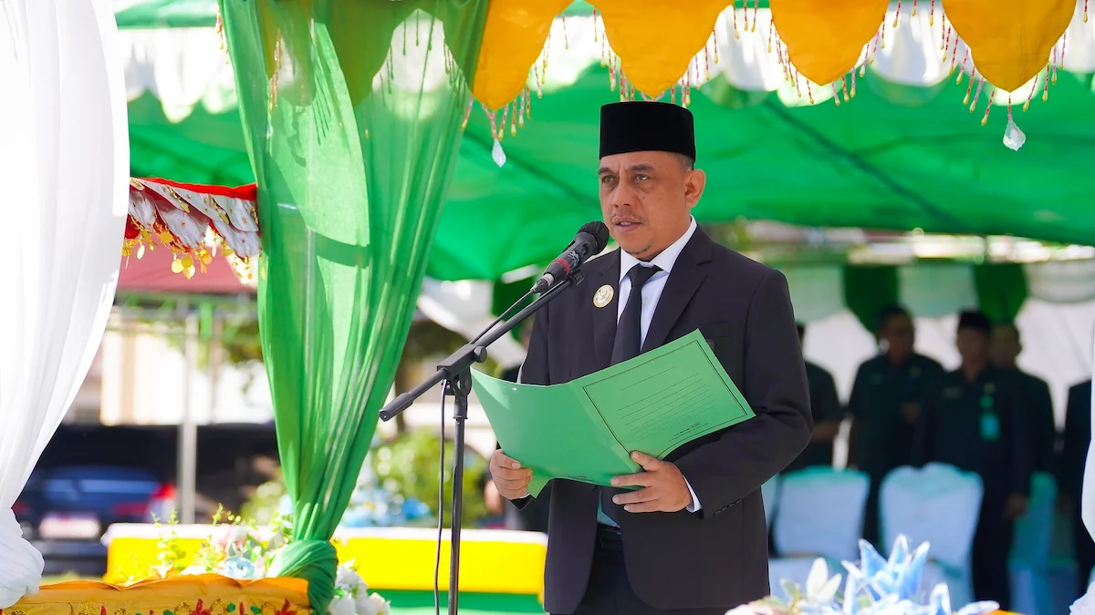 Bupati Yusra Alhabsyi menyampaikan sambutan saat Harkitnas 2026 di Bolmong